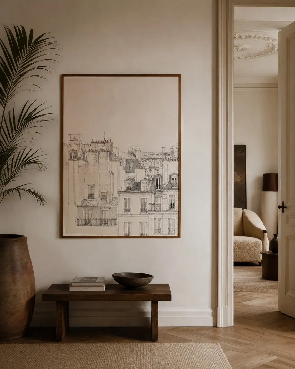 Fine pen sketch of Paris rooftops, framed in a hallway